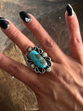 Oblong Turquoise Stone with Decorative Sterling Silver Ring